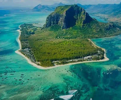 Mauritius - Volcanic island context - cyclonic wind loads, terraced terrain, mixed urban fabric.